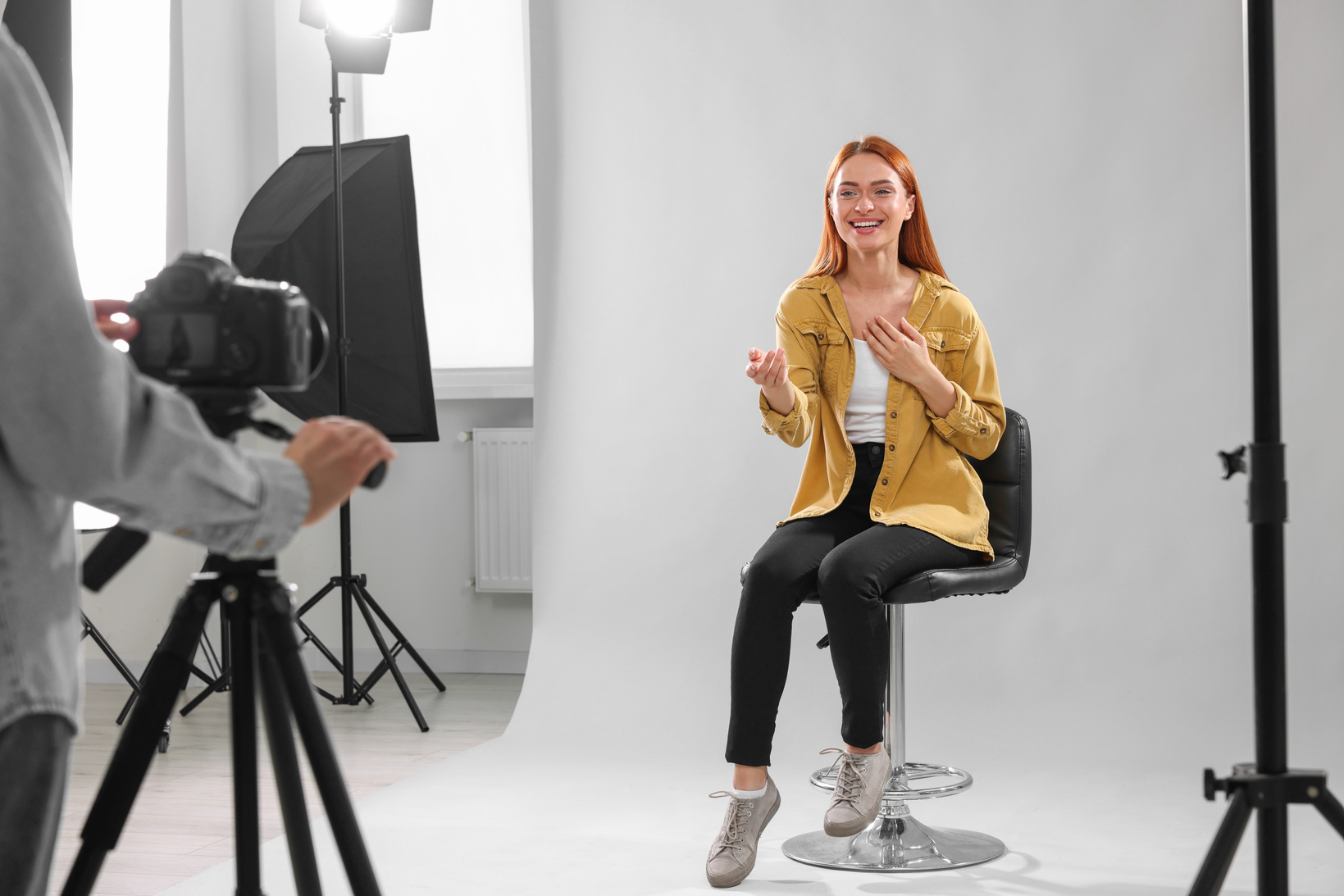 Casting Call. Woman Performing While Camera Operator Filming Her